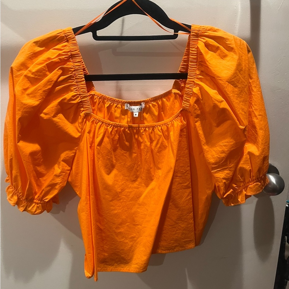 orange puffy english factory top size M